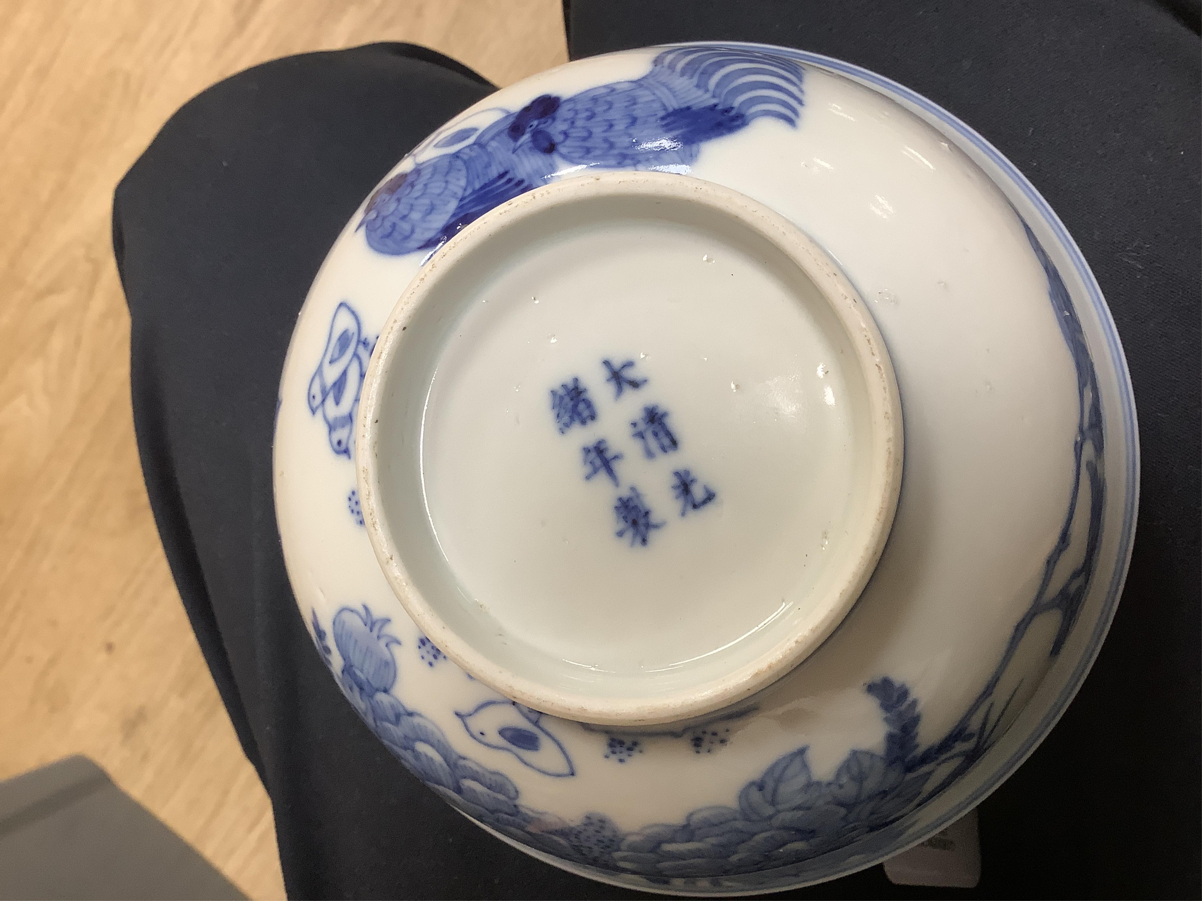A Chinese blue and white bowl, decorated with flowers and birds, 14.5cm in diameter